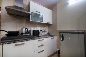 Kitchen of medical stay apartment near Fortis Hospital Gurgaon